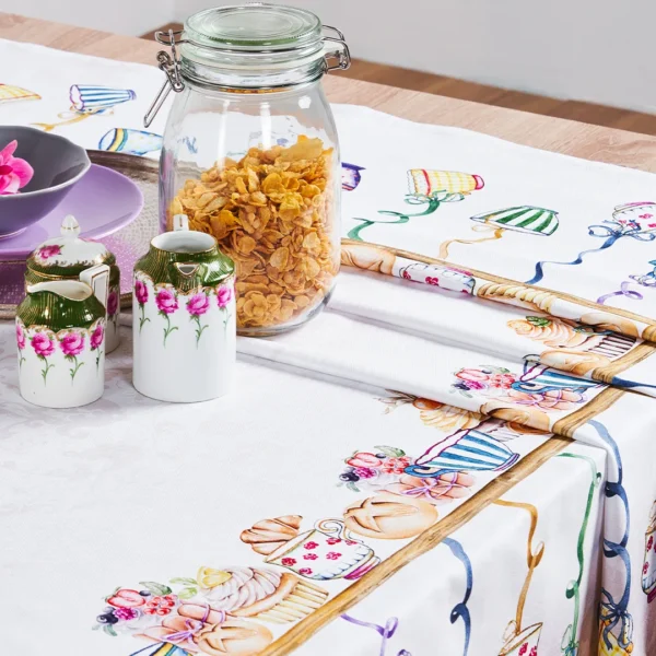 Tovaglia Tiffany 17 Vingi con design di dolcetti e tazzine da tè su sfondo pastello