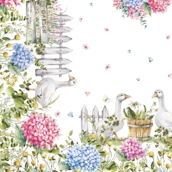 Tovaglia Tiffany 25 by Vingi con ortensie colorate e oche bianche in stile country chic
