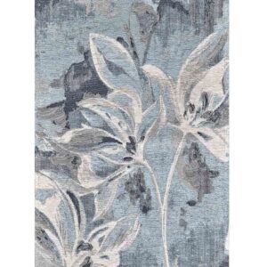 Tappeto Vanilla Azzurro by Suardi con fiori stilizzati bianchi e grigi su fondo azzurro sfumato