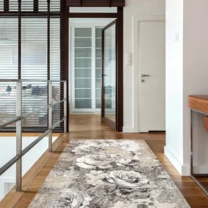 Tappeto rose tortora in salotto elegante con divano chiaro e legno naturale