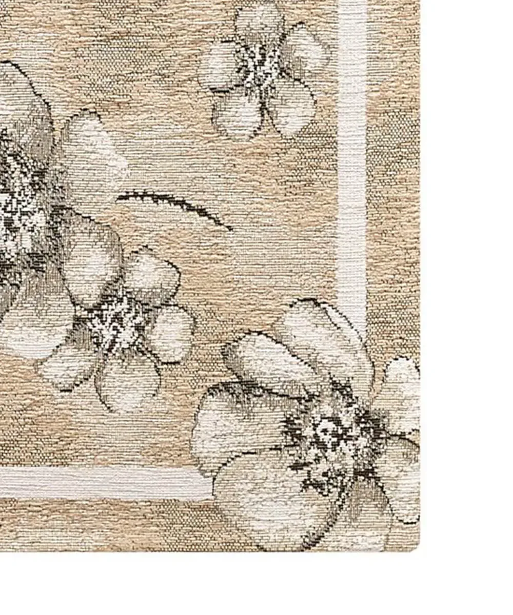 Dettaglio dei fiori jacquard e del bordo del tappeto Emily Tortora in chenille