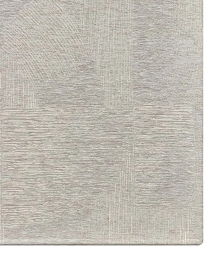 Dettaglio della trama a graffio in chenille jacquard del tappeto Graffio Sabbia