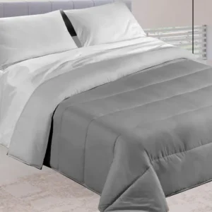 Trapunta Double Face Grigio Scuro e Chiaro invernale con un elegante double face in tinta unita nei toni del grigio scuro e del grigio chiaro - foto 1